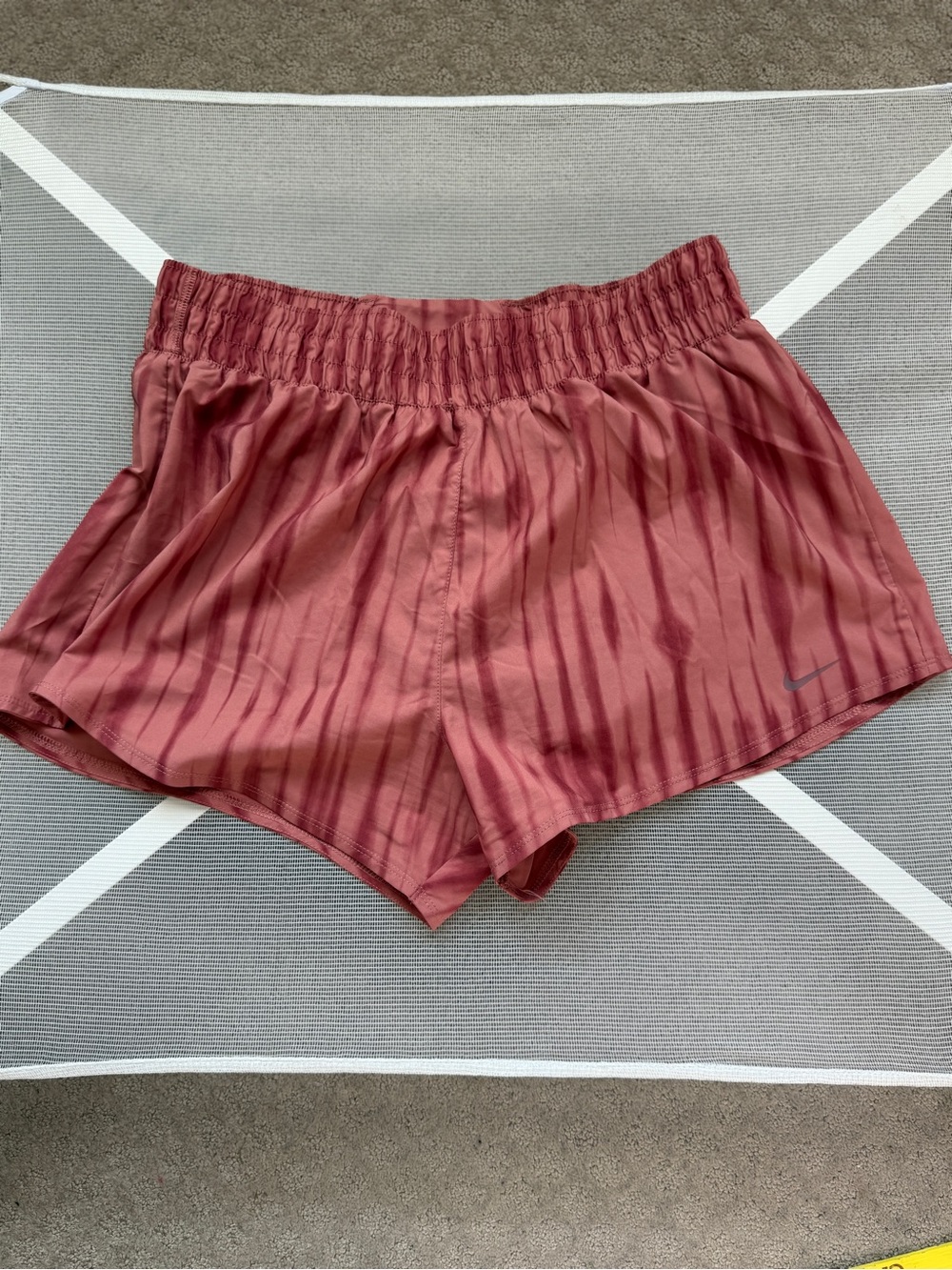 Nike Women's Rose Red Athletic Shorts with Subtle Swoosh